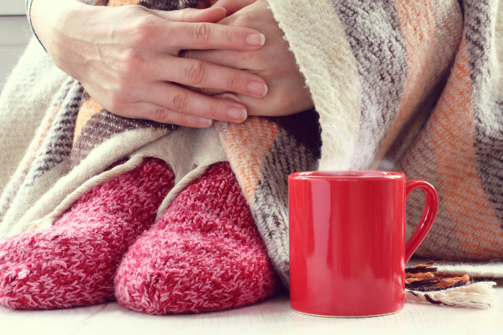 Red,Mug,With,Hot,Medicine,And,A,Man,In,Warm fusspflege ebersbach - fusspflege zu haus